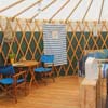 Traeth Yurt inside dinning table and seating area