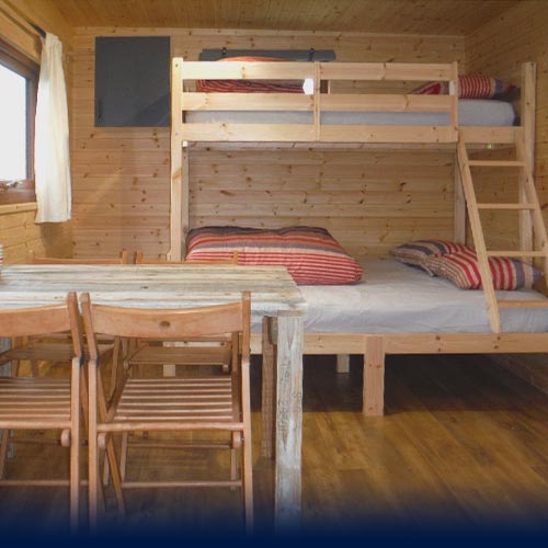 Bunk Beds and dining area inside the Eco Den